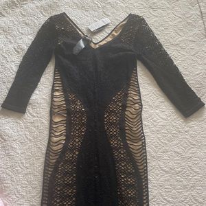 NWT Bebe dress. Size small. Black and nude